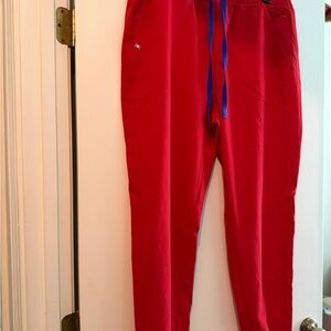 FIGS Women’s High Waisted Uman Relaxed Jogger Scrub Pants in Winning Red